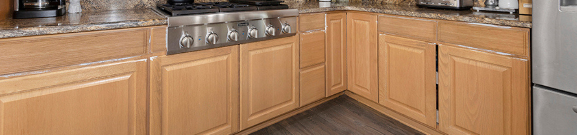 Photo of kitchen with old cabinets before refinishing