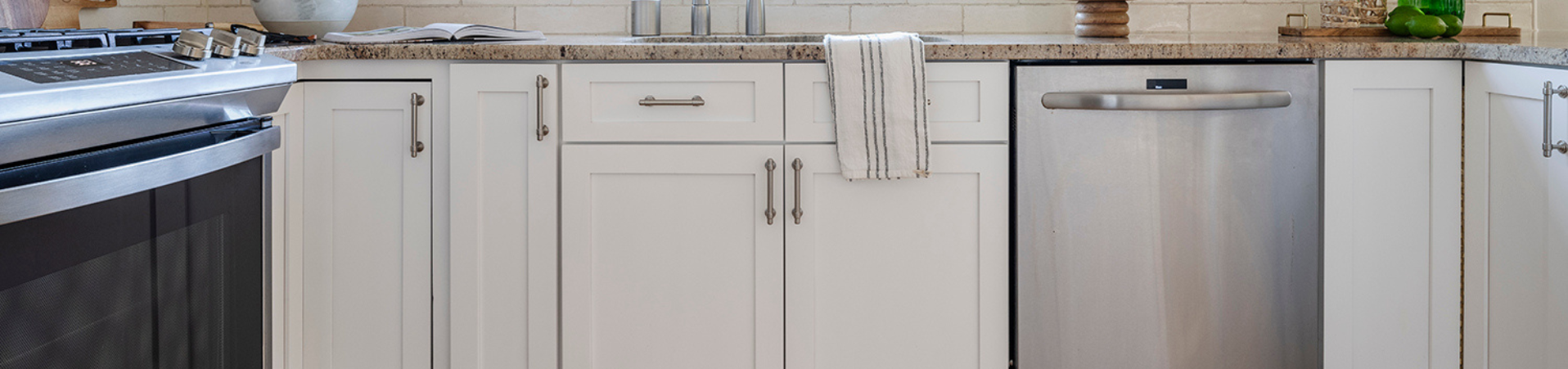 Photo of kitchen with blue and white refinished cabinets