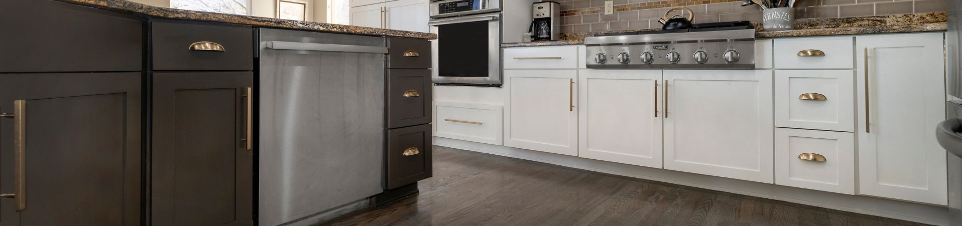 Photo of kitchen with blue and white refinished cabinets