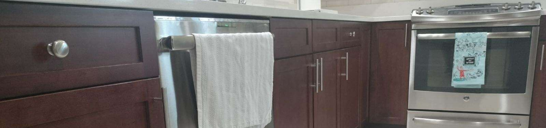 Photo of kitchen with old cabinets before refinishing