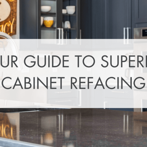 navy colored cabinets with the words Your Guide to Superior Cabinet Refacing