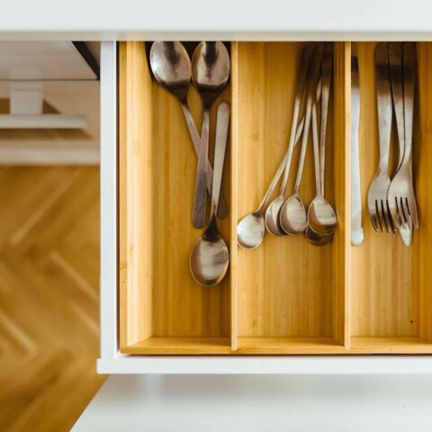 silver utensils in drawer