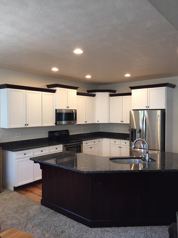 kitchen cabinets painted white by N-Hance Wood Refinishing of Huntsman