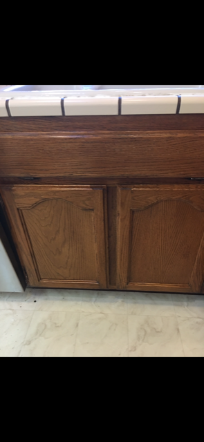 dark wood cabinet after refinishing