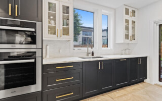 kitchen with dark wooden cabinets and white marble countertops