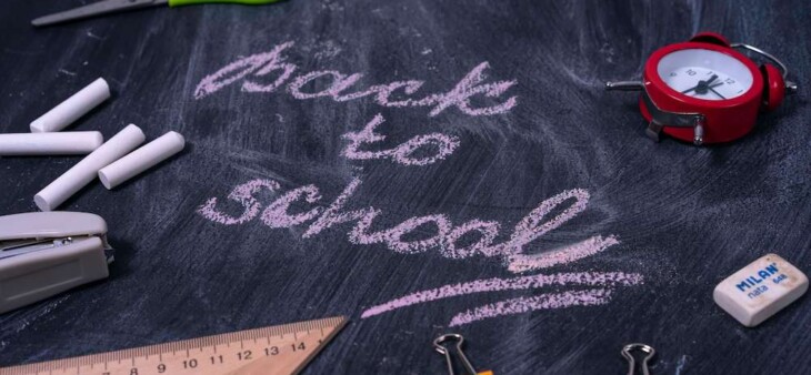 back to school written on a chalk board