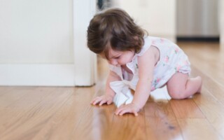 hardwood floor with baby