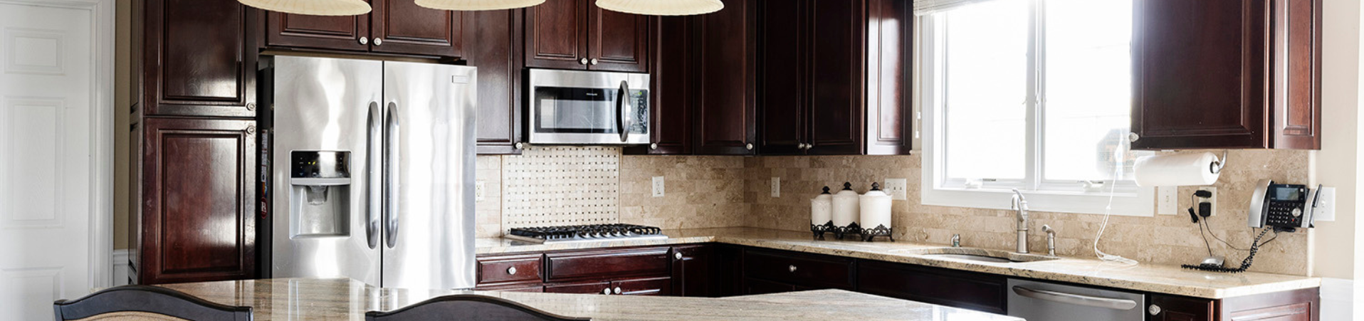 Photo of kitchen with old cabinets before refinishing