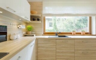 kitchen with light wooden cabinets