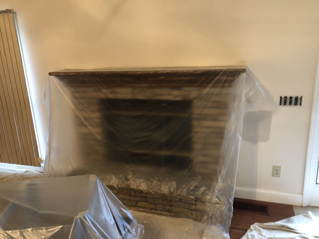 before fireplace banister painting