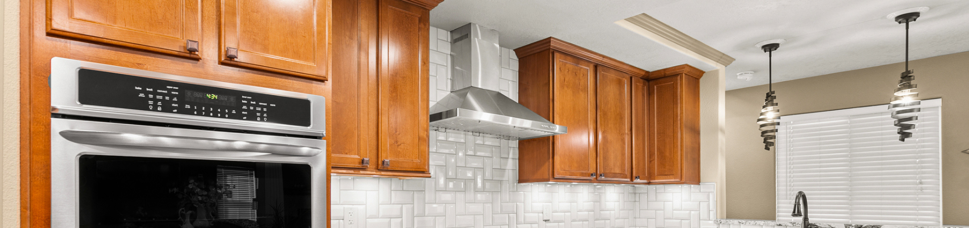Photo of kitchen with old cabinets before refinishing