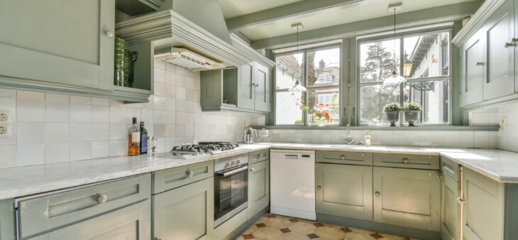 kitchen with natural lighting and green cabinets in Solano County