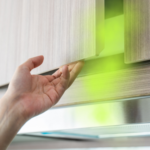 woman opening cabinet with smell