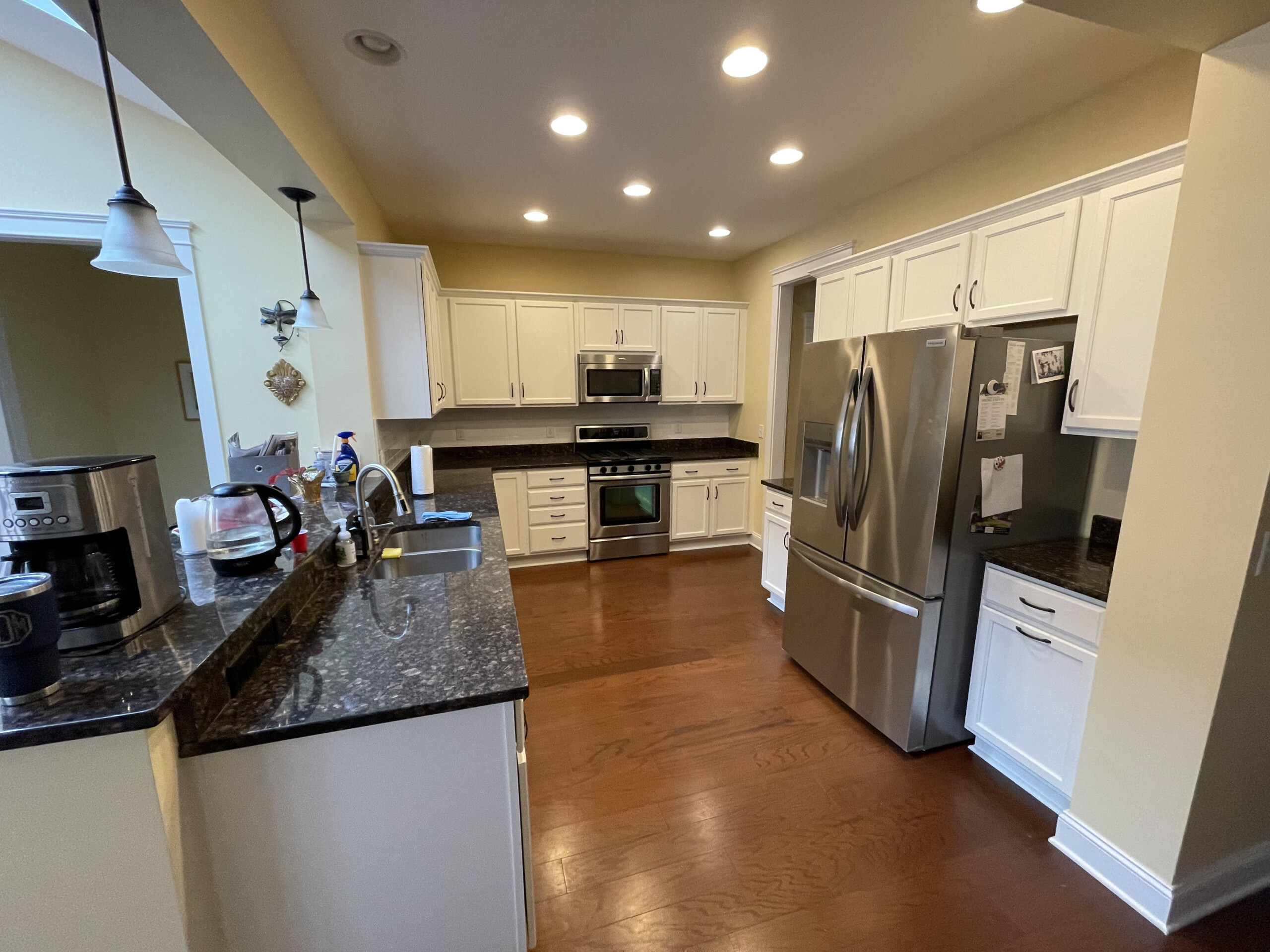 refinished kitchen cabinets that are white
