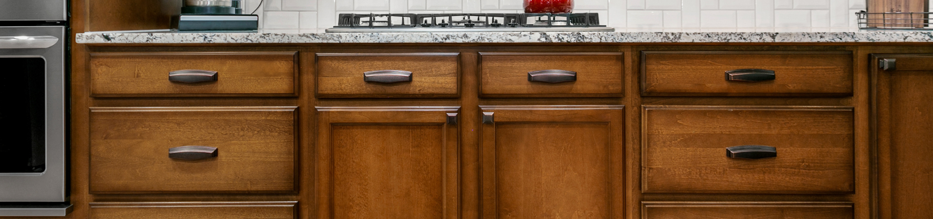 Photo of kitchen with blue and white refinished cabinets