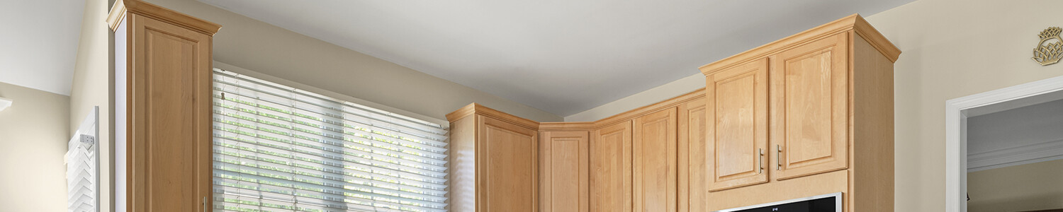 Photo of kitchen with old cabinets before refinishing