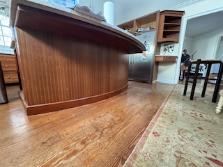 brown cabinets waiting to be refinished