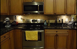 Brown cabinet that needs refinishing