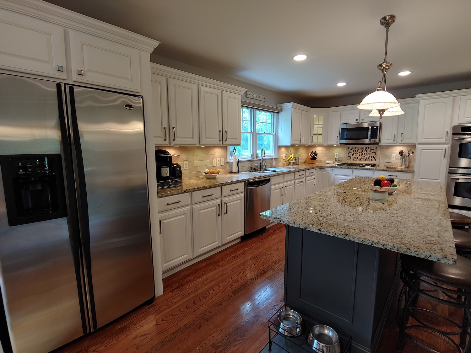 Beautiful White Kitchen after cabinet painting