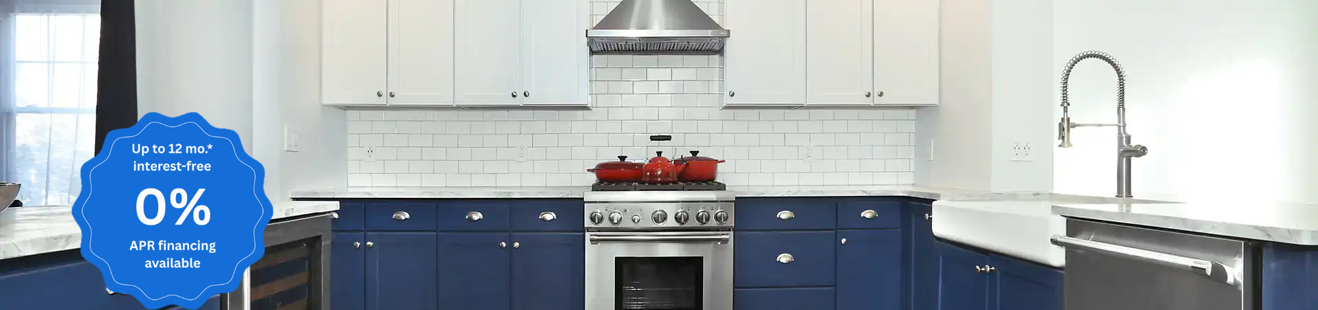 Photo of kitchen with blue and white refinished cabinets