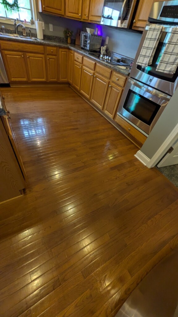 hardwood floors in front of kitchen cabinets