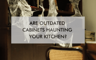 cabinets with spider webs and title "are outdated cabinets haunting your kitchen?"
