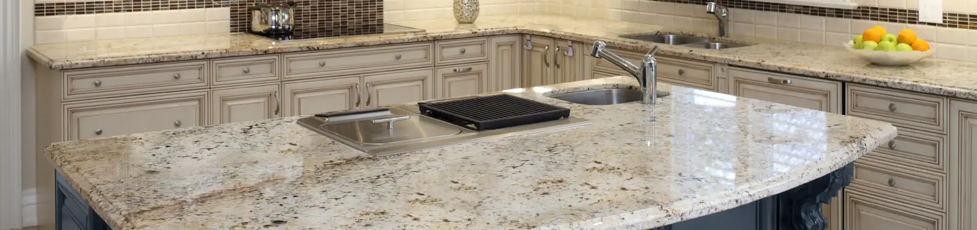 Photo of clean, newley refishied granite kitchen coutertops