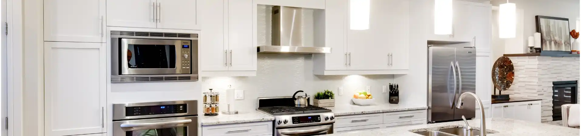 Kitchen photo with professionnally painted white cabinets