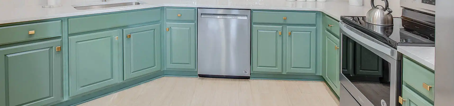 Photo of kitchen with custom sage green paint color