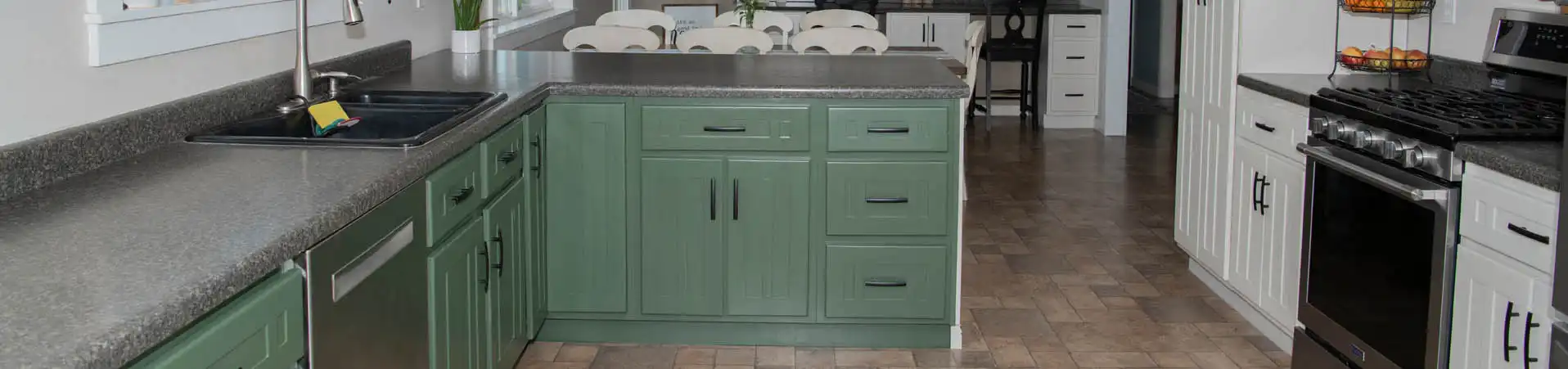 Photo of kitchen with custom dark green paint color